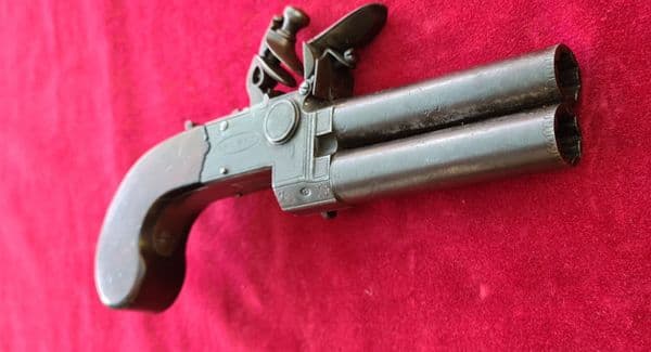 A scarce double Barrelled Tap Action Flintlock Pistol, made by  J. & W. Richards of LONDON.Ref 3935